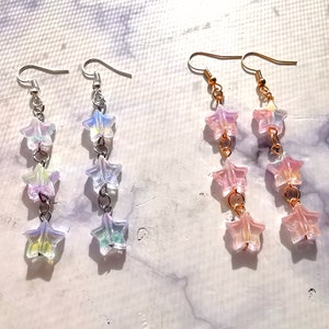 Holographic star earrings