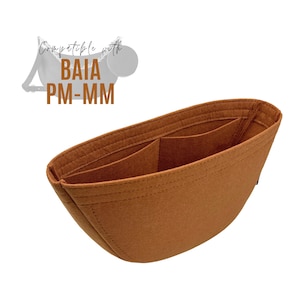 May include: A brown felt bag organizer with multiple compartments. Compatible with the Baia PM-MM bag.
