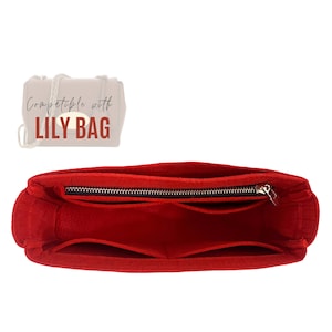 May include: Red felt bag organizer with multiple compartments and a zipper closure. Compatible with Lily Bag.