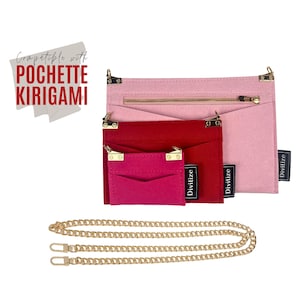 May include: A set of three pink, red and fuchsia felt pouches with gold hardware and a gold chain strap. The pouches are labelled "Divitilize" and are compatible with the "Pochette Kiriagami".