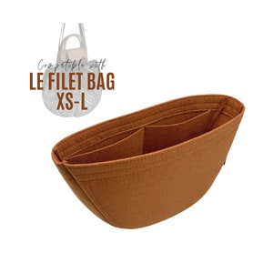 May include: A brown felt bag organizer with multiple pockets. Compatible with Le Filet Bag XS-L.