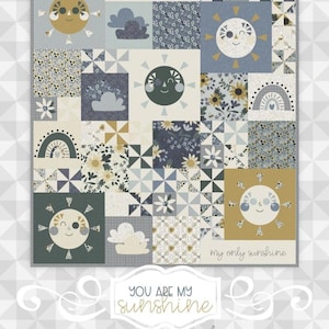 May include: A quilt pattern featuring a patchwork design with suns, clouds, and floral patterns in shades of blue, yellow, and green. The quilt is titled "You Are My Sunshine" by meags & me.
