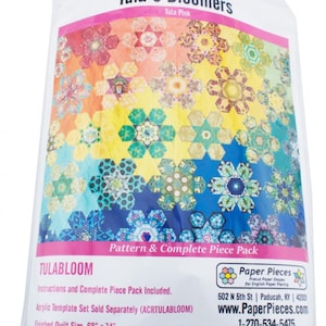 May include: A package labeled "Tula's Bloomers" with a colorful floral pattern. The package includes a pattern and complete piece pack for a quilt. The finished quilt size is 68" x 74". The package also includes the text "TULABLOOM".