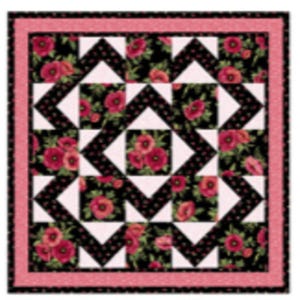 May include: A quilt block with a black and white geometric pattern featuring a repeating diamond shape. The background is a black fabric with white polka dots. The diamond shapes are filled with a floral fabric featuring red poppies on a black background.