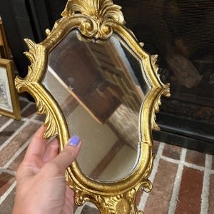 Stunning vintage gold ornate Victorian style Florentine wooden framed mirror 14.5x9”made in Italy