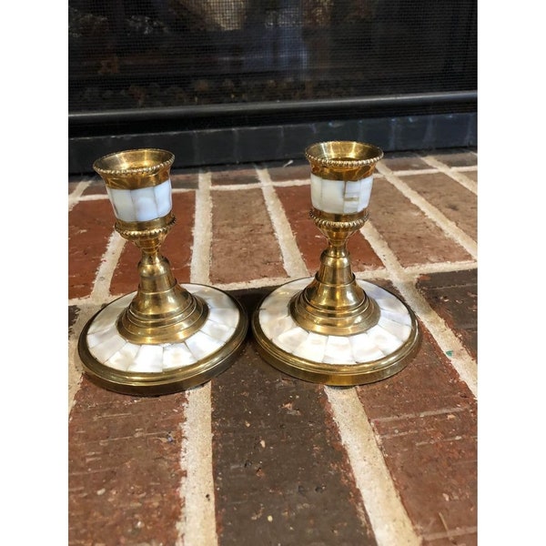 pair of vintage gold brass  and mother of pearl candlestick holders 4 inches tall each
