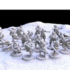 May include: A group of miniature soldier figurines in futuristic armour, positioned on a textured, snow-like base. Some figures are standing, others are lying down, all holding weapons. The backdrop is a stark white, creating a dramatic contrast.