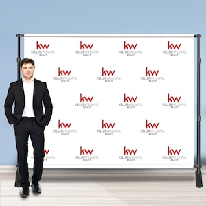 May include: A white backdrop with a repeating pattern of the red "kw" logo for Keller Williams Realty.