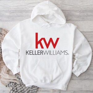 May include: White hooded sweatshirt with the red "kw" logo and the text "KELLERWILLIAMS" printed on the front.