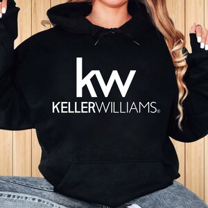 May include: Black hooded sweatshirt with a white "kw" logo and the text "KELLERWILLIAMS" below it.