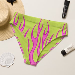 May include: Lime green bikini bottoms with a pink flame pattern.