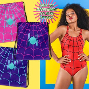May include: Three drawstring bags with a spider web design in pink, purple, and blue. The bags have a turquoise spider in the center. The text "CHECK OUT MOODYSUNDAY FOR MORE OPTIONS!" is in a yellow starburst.