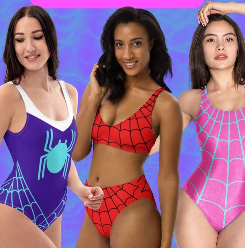 May include: Three women wearing different swimsuit styles featuring a spider web design. One swimsuit is purple with a turquoise spider, another is a red and black two-piece, and the third is pink with a light blue spider web.
