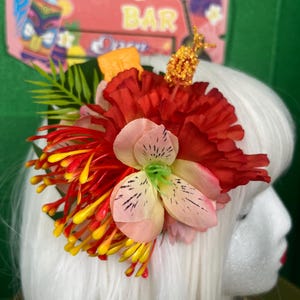 Tropical tiki hibiscus hair flower hair clip with tiki swizzle stick