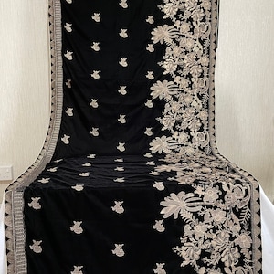 Pure micro Velvet Shawl with golden tilla embroidery in bottle green colour.