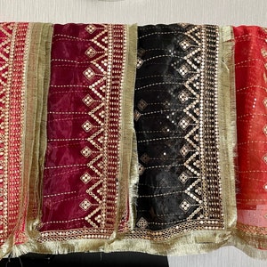 Beautiful embroidered organza Dupata with kiran lace allover.
