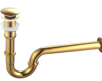 May include: A polished gold-tone P-trap sink drain assembly featuring a vertical pipe with a threaded top section, a white silicone gasket, a circular drain stopper, and a horizontal pipe extension designed for bathroom plumbing installation.