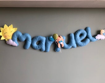 Name banner with with sun, clouds and baby