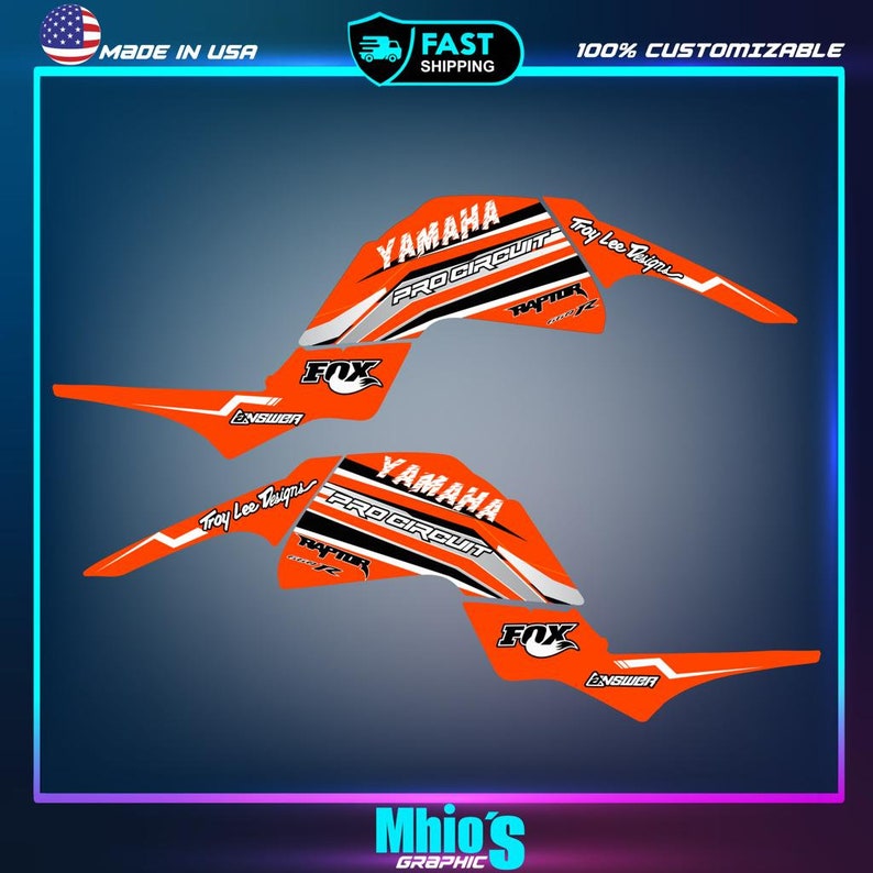 May include: Orange and white Yamaha Pro Circuit ATV graphics kit with Fox Racing and Troy Lee Designs logos.