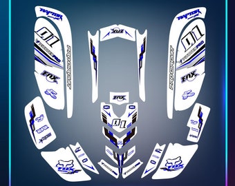 May include: A white and blue motorcycle graphic kit with the words "Procircuit", "Pitster Pro", "Fox", and "Raptor" printed on it. The kit includes a number "01" and a number "X3" graphic.