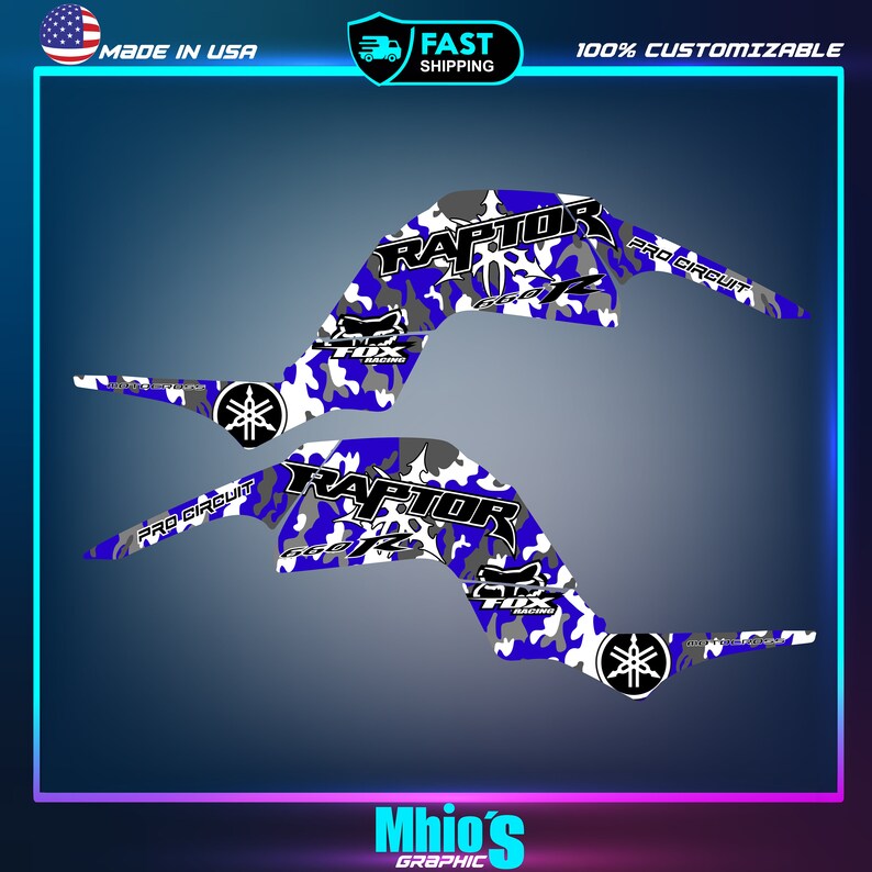 May include: A set of two blue, white, and gray camouflage graphic decals for a Yamaha Raptor ATV. The decals feature the words "RAPTOR" and "PRO CIRCUIT" in black lettering.