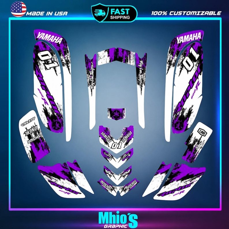 May include: A set of purple, black, and white adhesive decals for a Yamaha Raptor 660R ATV. The graphics feature the text Yamaha, Raptor 660R, Troy Lee Designs, O'Neal, Showa, GoPro, and 100% with the number 01 printed on the main side panels.