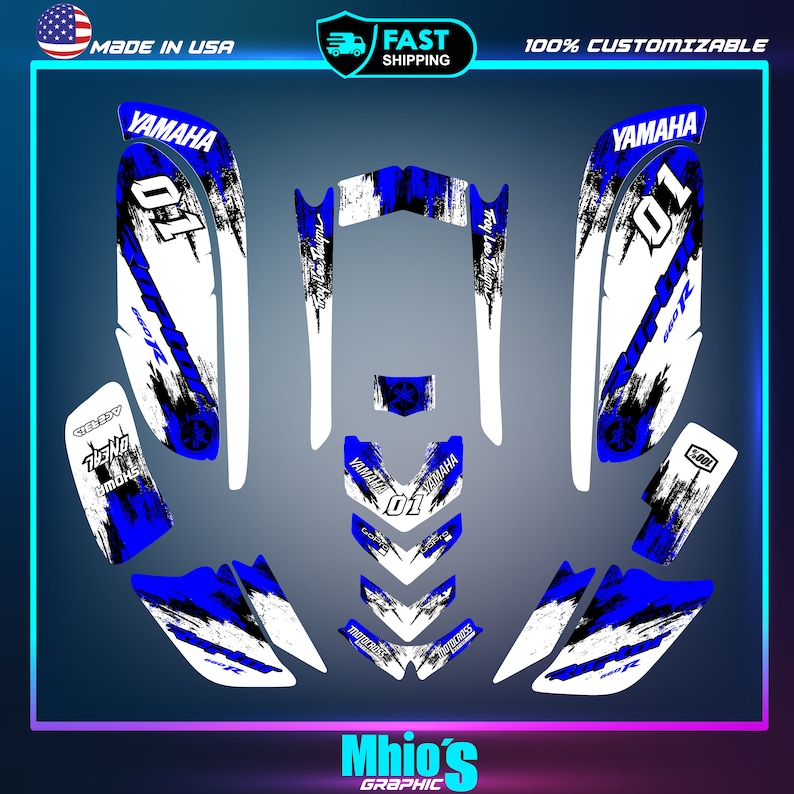 May include: Yamaha motorcycle graphics kit in blue, white, and black with a grunge design. The kit includes a number plate with the number "01" and the text "Yamaha" and "Troy Lee Designs".