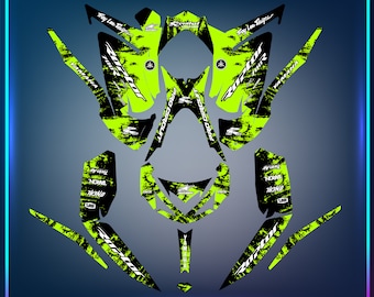 Może przedstawiać: Zielony i czarny projekt graficzny dla quada Yamaha Raptor. Projekt zawiera napisy "Troy Lee Designs", "Pro Circuit", "Twin Air" i "Oneal".