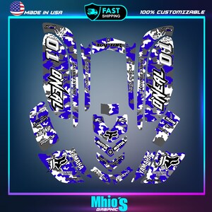 May include: A set of blue, white, and gray motocross graphics featuring a camouflage pattern, the words "ONEAL" and "RAPTOR", and the logos of GoPro, Motul, and Yamaha.