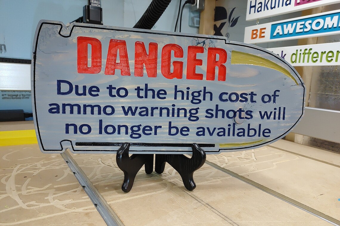 Bullet Shaped Warning Sign DANGER Warning Shots No Longer Available