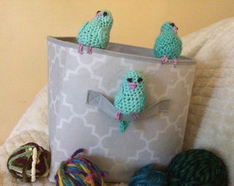 Crocheted blue parakeet