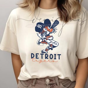 Maglietta comfort colorata da baseball dei Tigers / Tigre dei cartoni animati / Maglietta Motor City Kittie / Maglietta da baseball dei Michigan Tigers World Series