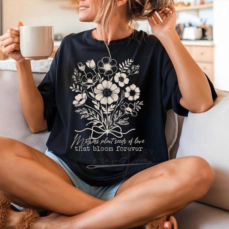 Comfort Colors  t-shirt with white floral bouquet and "Mothers plant seeds of love that bloom forever" text