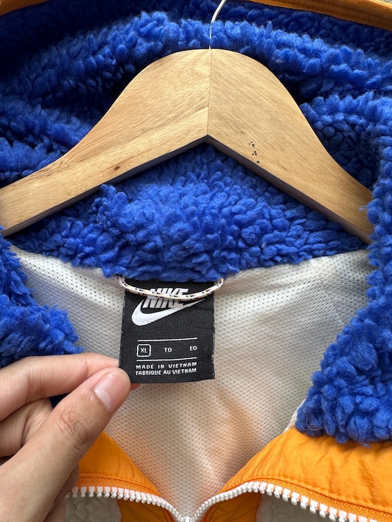 nike orange and blue jacket fluffy