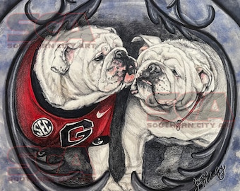 May include: A watercolor painting of two white bulldogs, one wearing a red and black University of Georgia jersey with the SEC logo and the letter 'G'. The bulldogs are looking at each other and appear to be kissing.