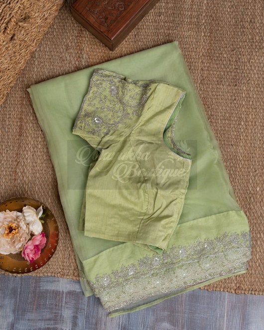 Turquoise green Pure Tissue Organza Polka Weave Saree main image 0