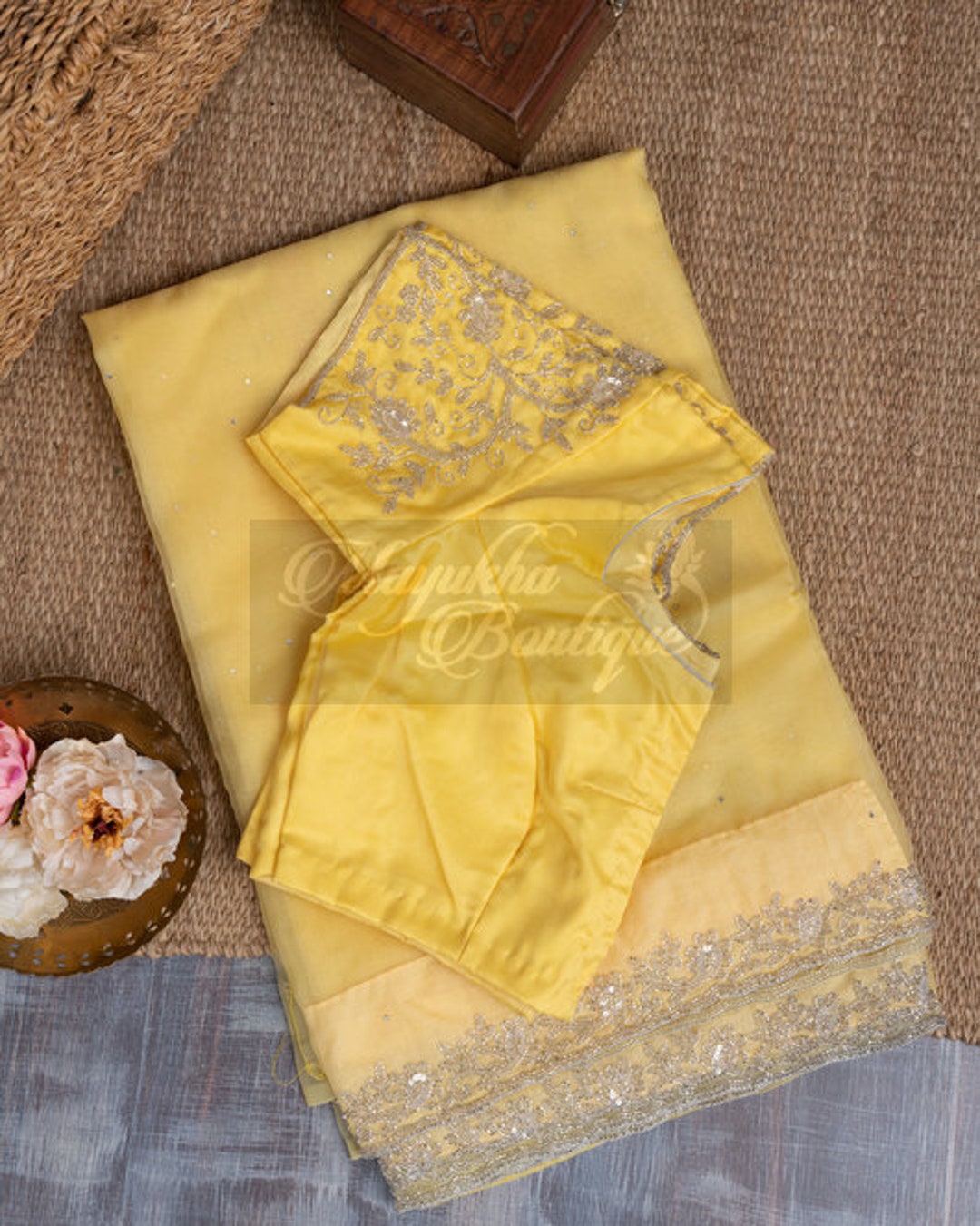 Lemon Yellow Tissue sequence embroidered saree paired with stitched blouse