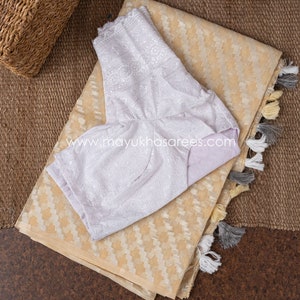 Pastel Orange and White Chikankari and Linen Gorgette Saree