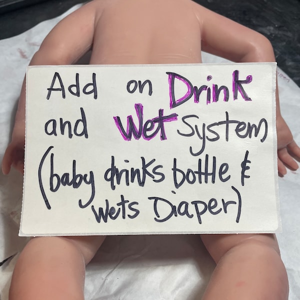 NOT A DOLL. Drink and wet system add on. Must purchase a doll with this.