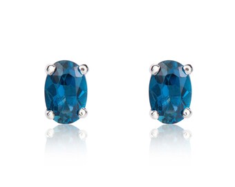 9CT White Gold, Oval London Blue Topaz Claw Set Stud  Earrings