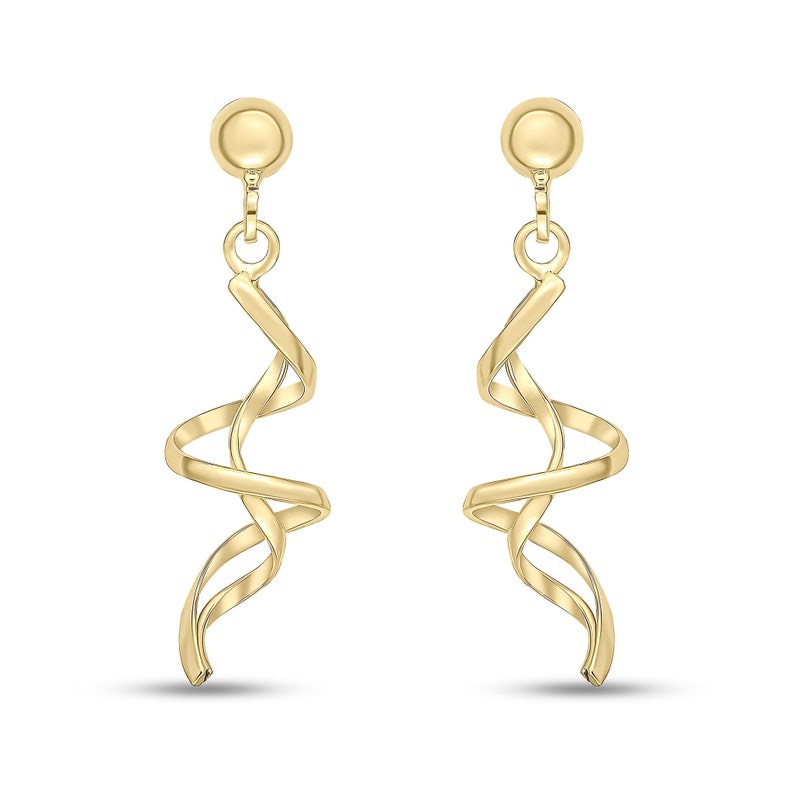 May include: A pair of gold-coloured spiral drop earrings. Each earring has a circular stud at the top, connected to a spiralling, ribbon-like design that hangs down. The earrings are shown against a white background.