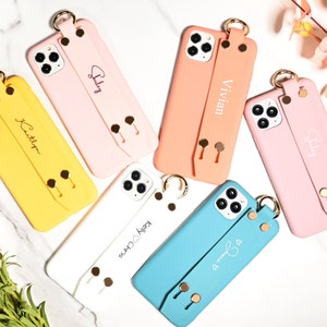 12 Colors Available Custom Name Phone Case with Personalized Wrist Band Soft Belt • Case with Built In Grip Holder • iPhone 11 12 6 7 8