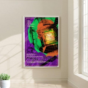 May include: A vintage movie poster for the film Vertigo, featuring a colorful abstract design with a circular pattern in the center. The poster includes the title "VERTIGO" in large, bold letters and the text "You Never Keep Souvenirs of a KILLING!" in smaller letters. The poster also features the names of the actors, James Stewart and Kim Novak, and the director, Alfred Hitchcock.