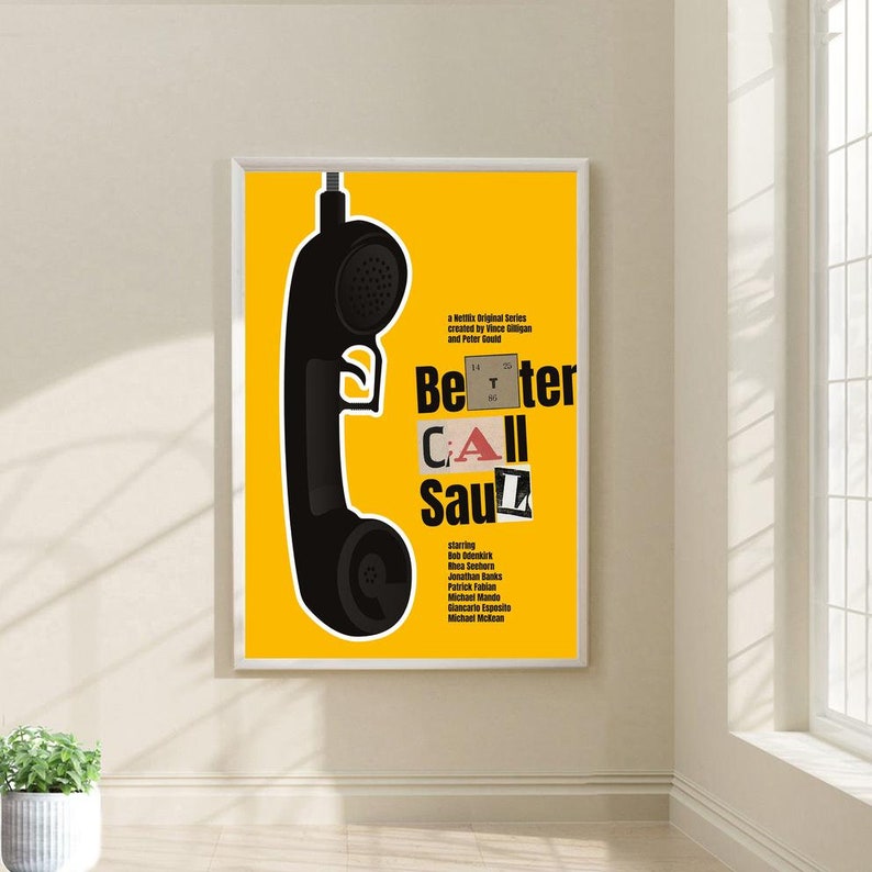 May include: A yellow poster with a black silhouette of a rotary phone. The text "Better Call Saul" is in white and red letters. The poster is a minimalist design for the TV show "Better Call Saul".