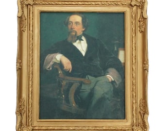 May include: A portrait painting of a man with a moustache and goatee, wearing a dark velvet jacket and white shirt, seated in a chair. The artwork is enclosed in an ornate, rectangular gold-coloured frame with detailed floral and scroll carvings.
