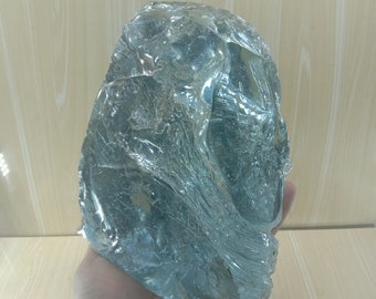 2685 grams of rough Andara, bluish-white crystal with clear fiber motif