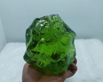 1731 grams of rough Andara Light green with bubble inside.