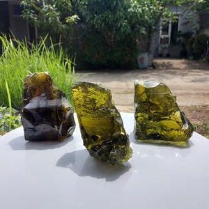 3 pcs 2888  grams of rough andara yellowish green and yellowish brown crystals
