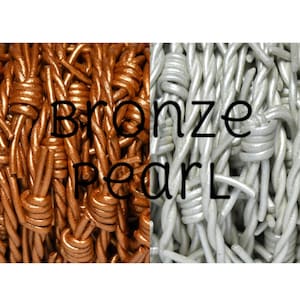 May include: Two strands of barbed wire, one in a bronze pearl finish and the other in a silver pearl finish. The text "Bronze Pearl" is superimposed on the image.