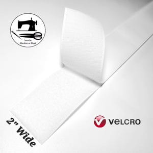 May include: White Velcro hook and loop tape, 2 inches wide, with a sewn-on or hand-sewn application. The image includes a logo with a sewing machine, scissors, and the word "Velcro".